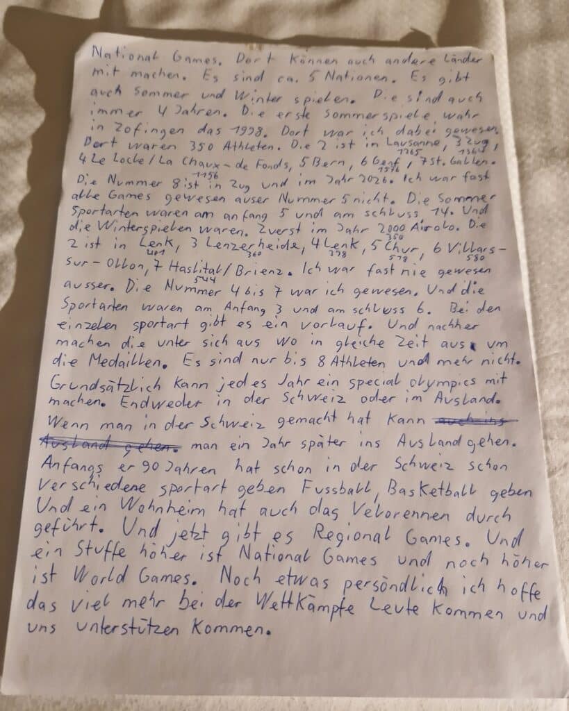 Handschriftlicher Text über National Games und Sportarten.